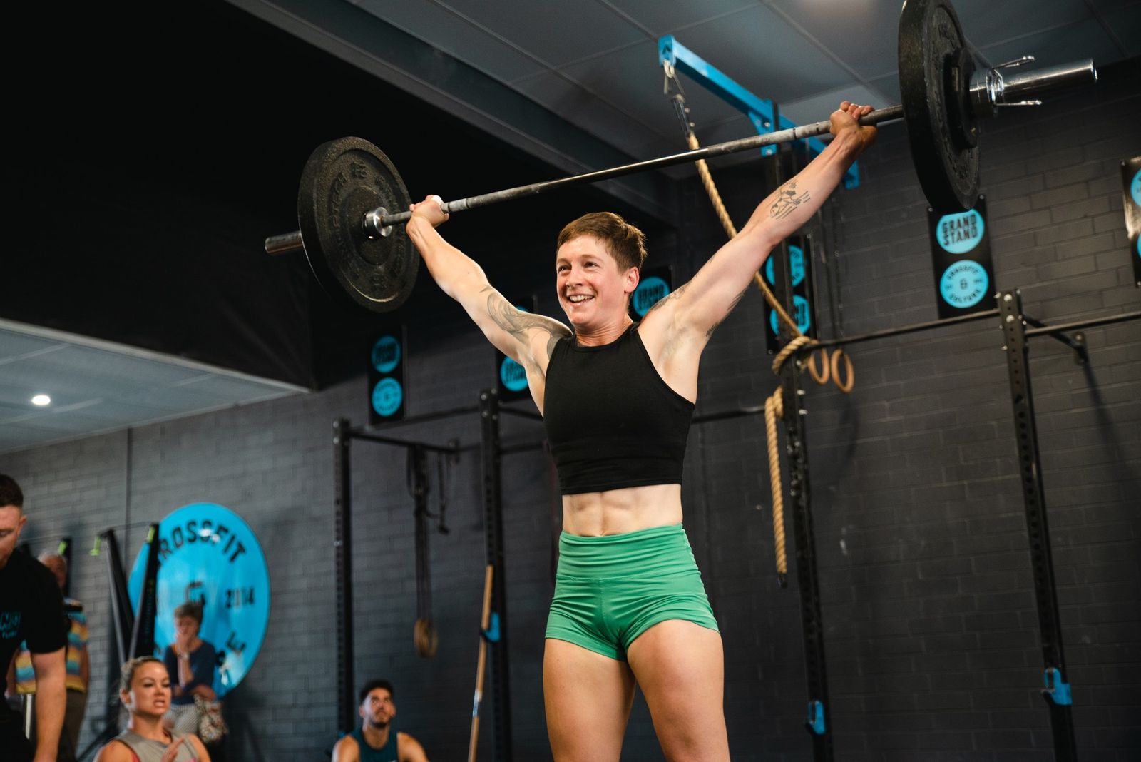 Grandstand CrossFit members celebrating together after a class